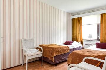 Фото номера Апартаменты с 3 спальнями Отель Hotelli Pohjankievari г. Кемпеле 2