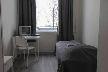 Фото номера Стандартный одноместный номер с общей ванной комнатой Мотели Kempeleen Moottorimaja г. Кемпеле 2