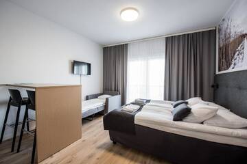 Фото номера Трехместный номер бизнес-класса Апарт-отели Forenom Aparthotel Kempele г. Кемпеле 4